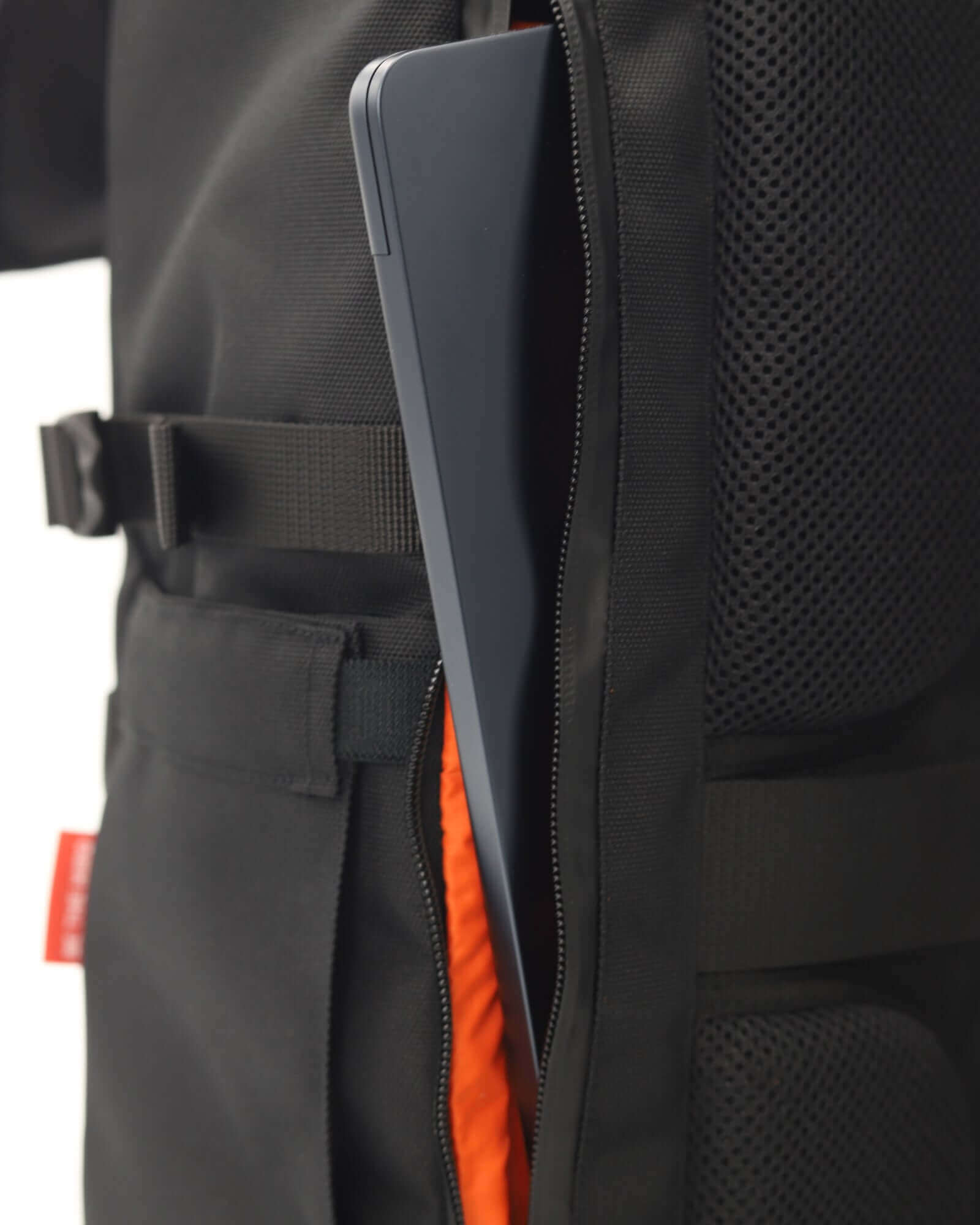 Minato Premium 6.0 Black Knight backpack featuring a laptop compartment with a sleek laptop inserted, showcasing premium durable backpack design.