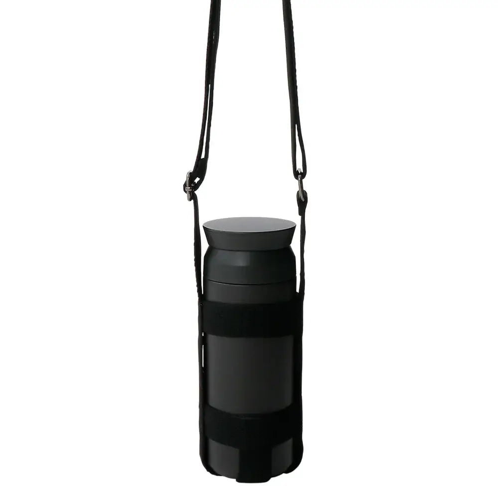 TUMBLER popruh 75mm black on a travel tumbler for outdoor activities and walks.